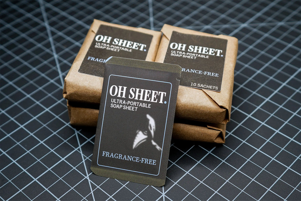 Packaged individually wrapped fragrance free paper soap sheets